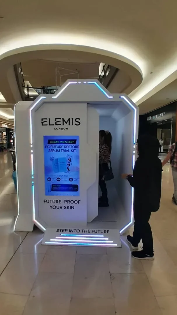 Elemis-branded photobooth with illuminated frame at a previous event